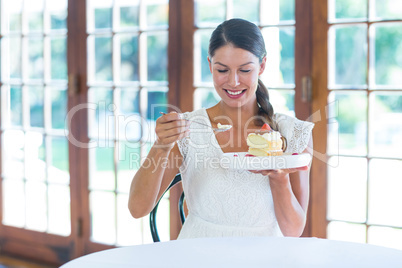 Woman having a pastry in restaurant Woman having a pastry in restaurant