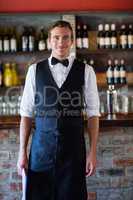 Portrait of confident waiter