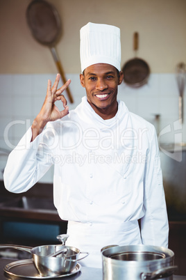 Portrait of happy chef making ok sign