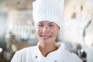Portrait of smiling female chef
