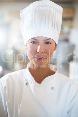 Portrait of confident female chef