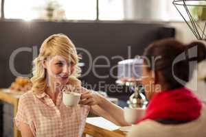 Customers drinking a coffee