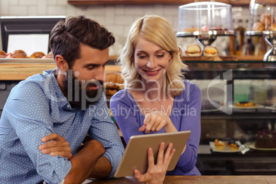 Couple using a tablet computer