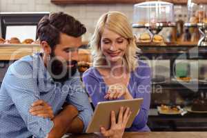 Couple using a tablet computer