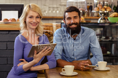 Couple using a tablet computer