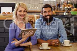 Couple using a tablet computer