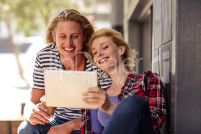 Couple using a tablet computer