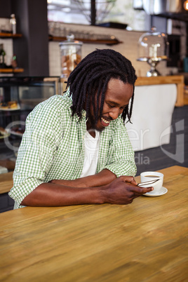 Hipster using a smartphone