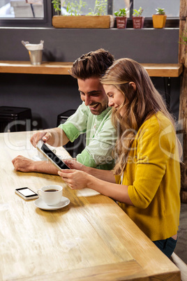 Couple using a tablet computer