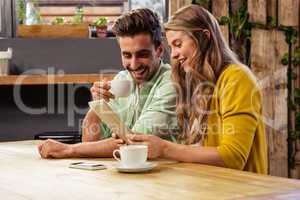 Lovely couple using a tablet computer