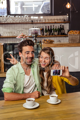 Funny couple taking a selfie