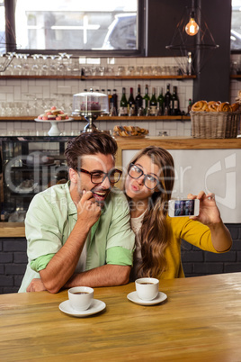 Funny couple taking a selfie