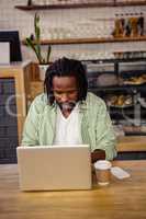 Young man using a laptop