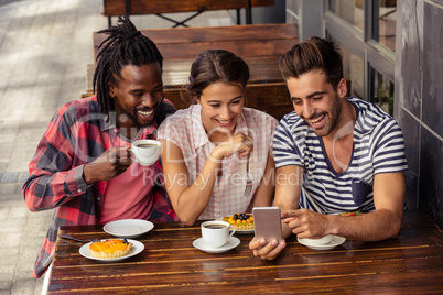 Friends using smartphone together