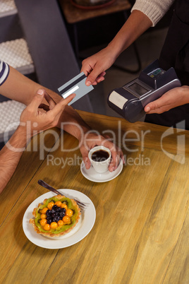 Waitress collecting payment
