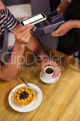 Waitress collecting payment