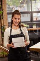 Waitress holding boxes with her hands
