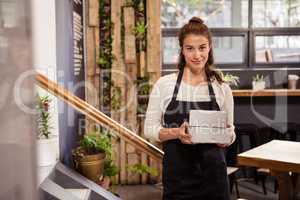 Waitress holding boxes with her hands