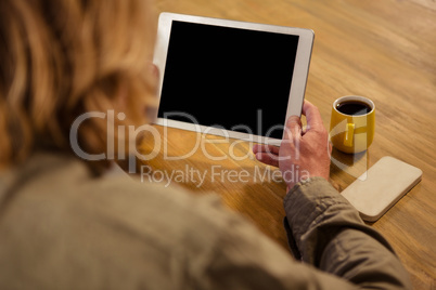 Focus on tablet with hands