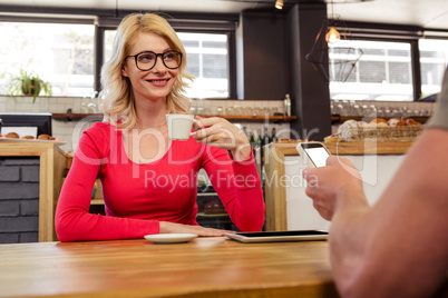 Woman drinking coffee