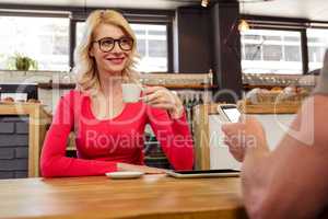 Woman drinking coffee