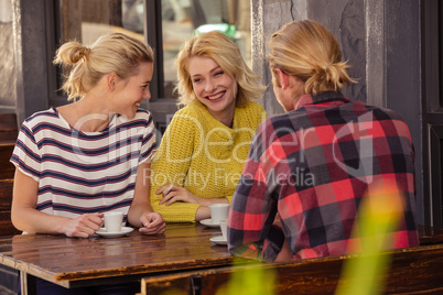 Friends drinking espresso