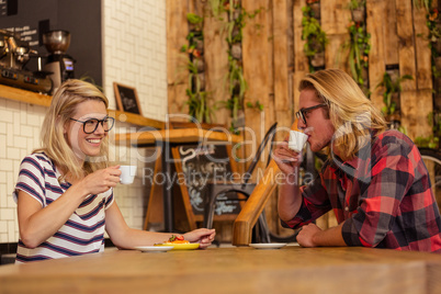 Couple drinking espresso