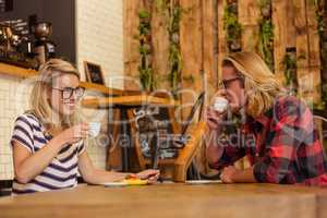 Couple drinking espresso