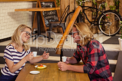 Couple drinking espresso