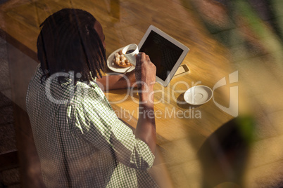 Man drinking an espresso