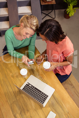 Women using a smartphone