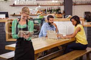 Waitress using a tablet