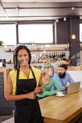 Waitress holding a tablet