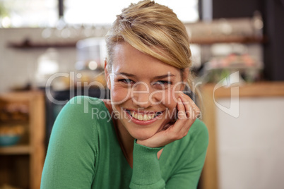 Woman smiling at camera sitting and smiling