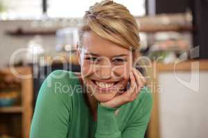 Woman smiling at camera sitting and smiling