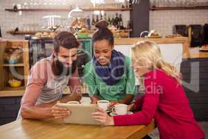 Friends using a tablet