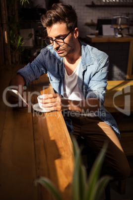 Man holding a cup of coffee