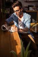 Man holding a cup of coffee