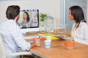 Two colleagues having a video conference