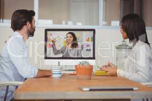 Two colleagues having a video conference