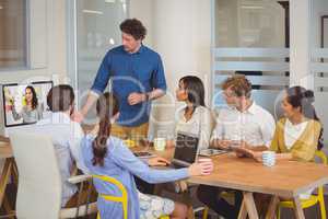 A worker team is doing a video conference