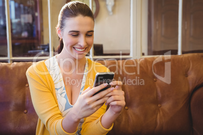 Business woman using her phone