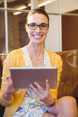 Business woman looking her tablet