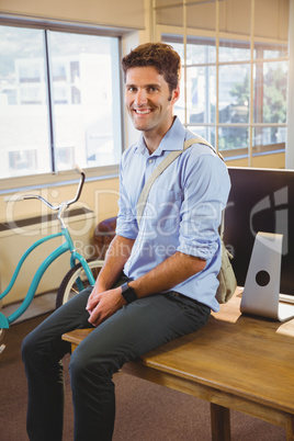 Business man posing in front of the camera