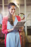 Businesswoman posing with her tablet