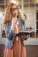 Business woman holding a book