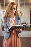 Business woman holding a book