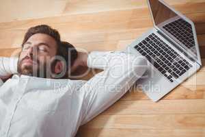 Business man lying on the floor