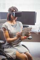 Business woman using 3D glasses