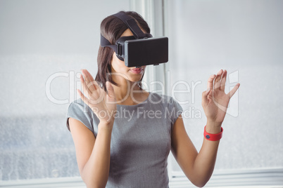 Business woman using 3D glasses